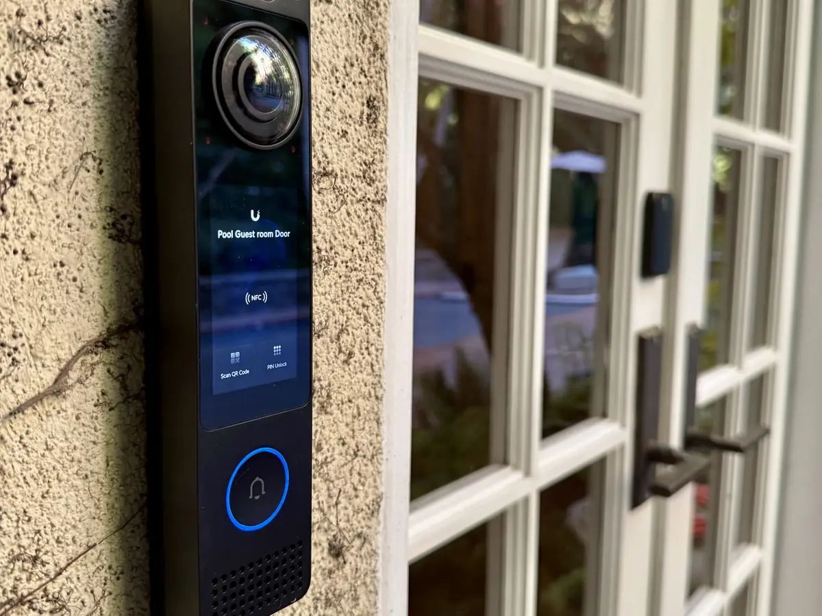 Intercom beside a glass door
